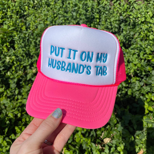 Put it on My Husband's Tab Embroidered Neon Pink Trucker Hat